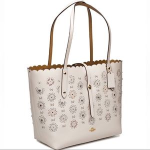 New Coach cut out tea rose. 14” w. 12” tall. 5” deep.